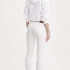 Levi 711 skinny ankle whit jeans with studded bottoms